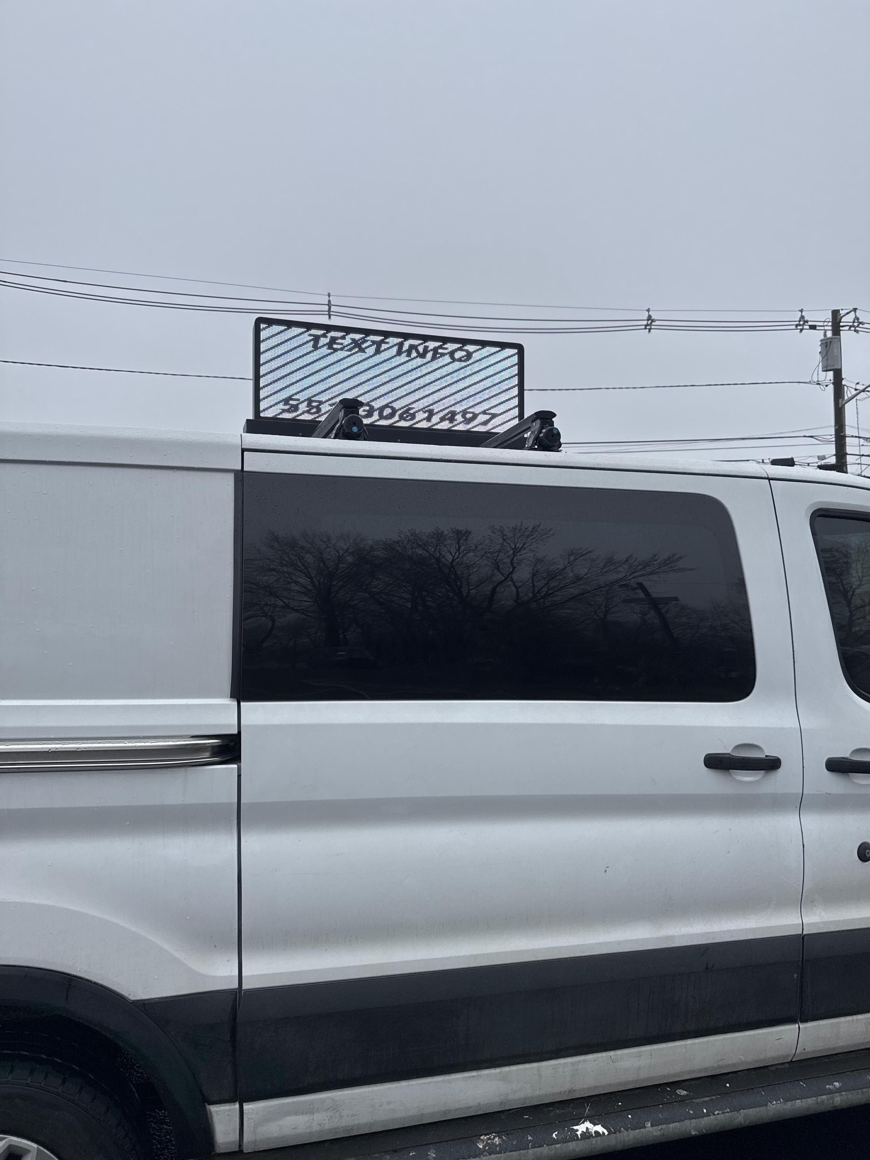 VanAds LED van — side view showing LED screen mount